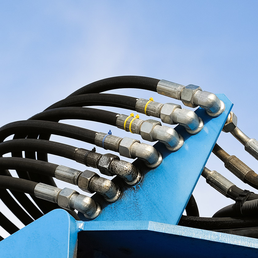 An industrial hoses being used in hydraulics.