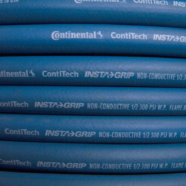 Close-up of a coil of blue Continental ContiTech Instagrip hose.