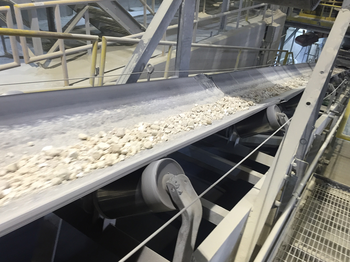 Conveyor belt carrying rocks