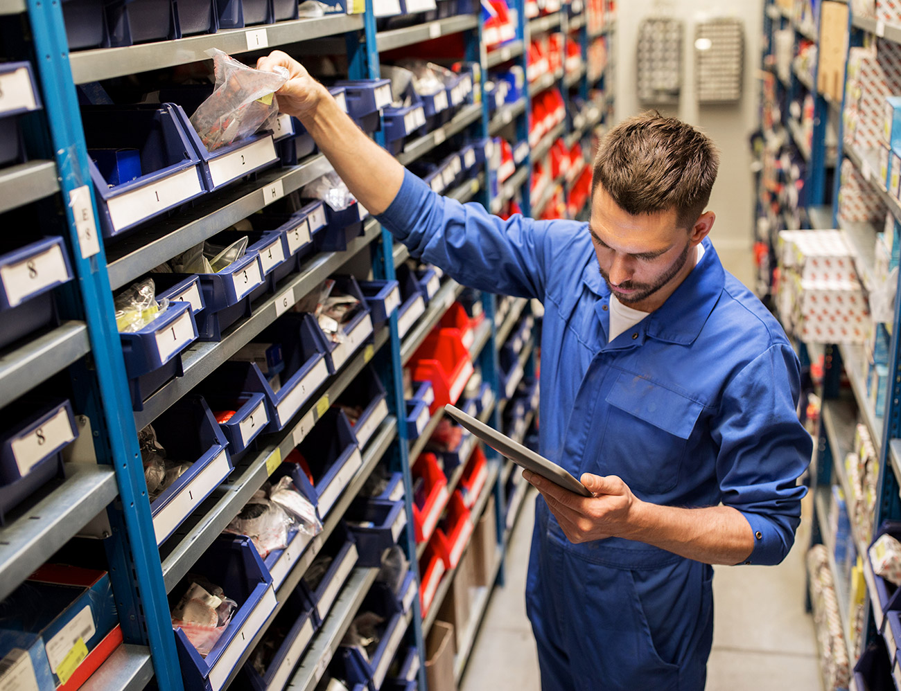 Binkelman employee sorting parts.