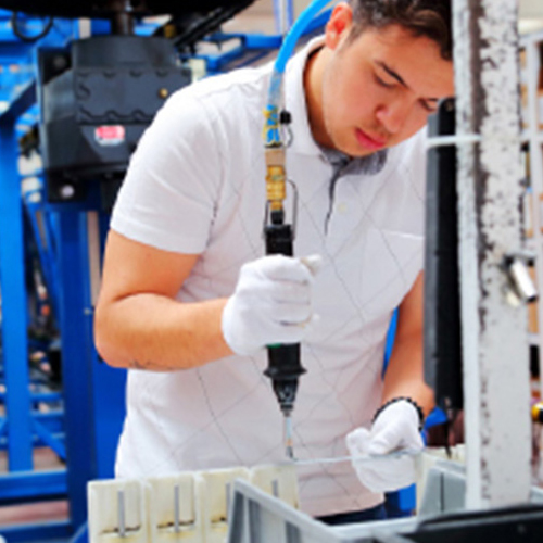 Employee assembling a hose